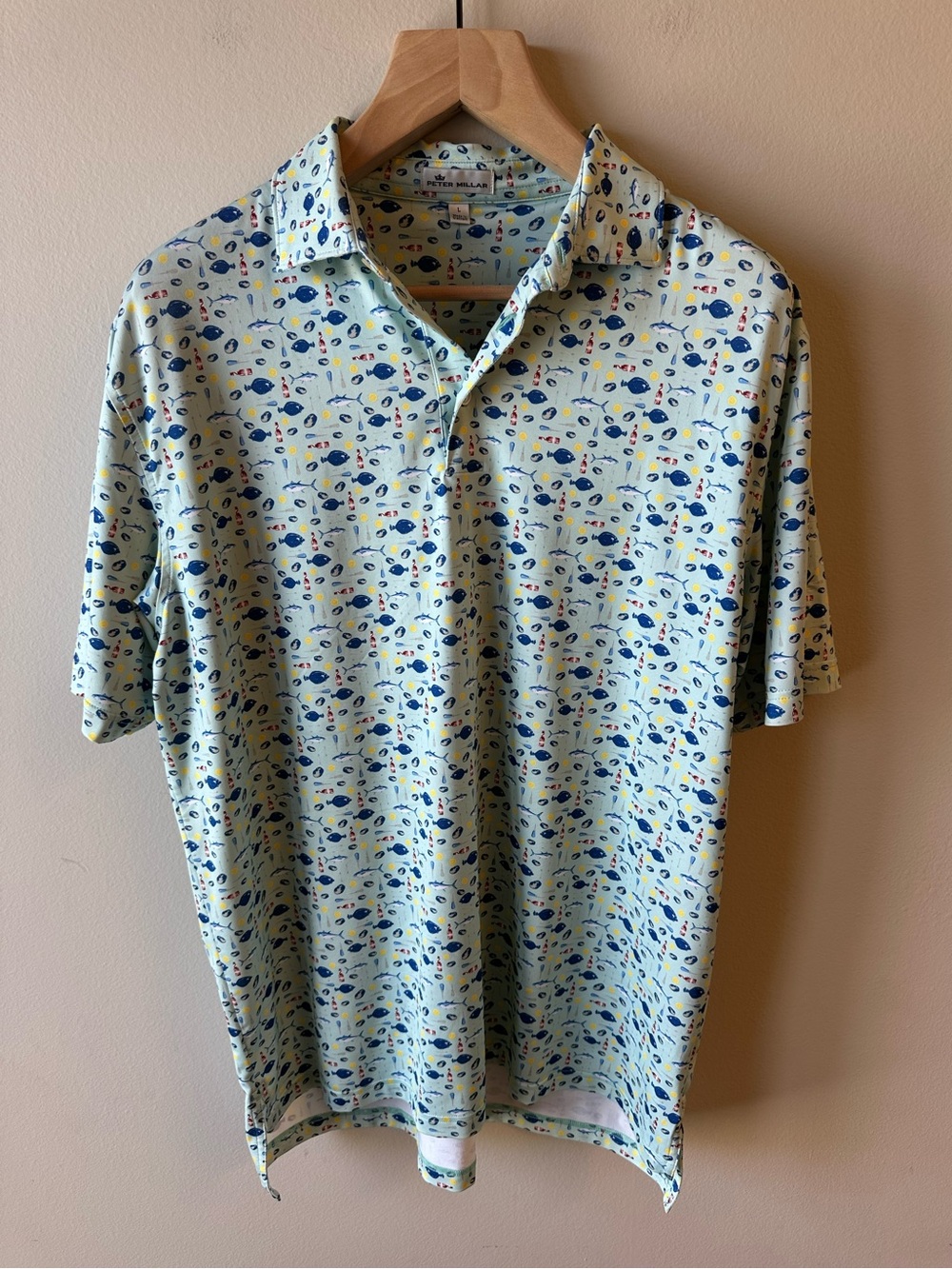 Peter Millar Light Blue Polo with Navy and Yellow Fish Print